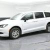 White Chrysler Voyager with BraunAbility Rear Entry Manual Fold Out conversion