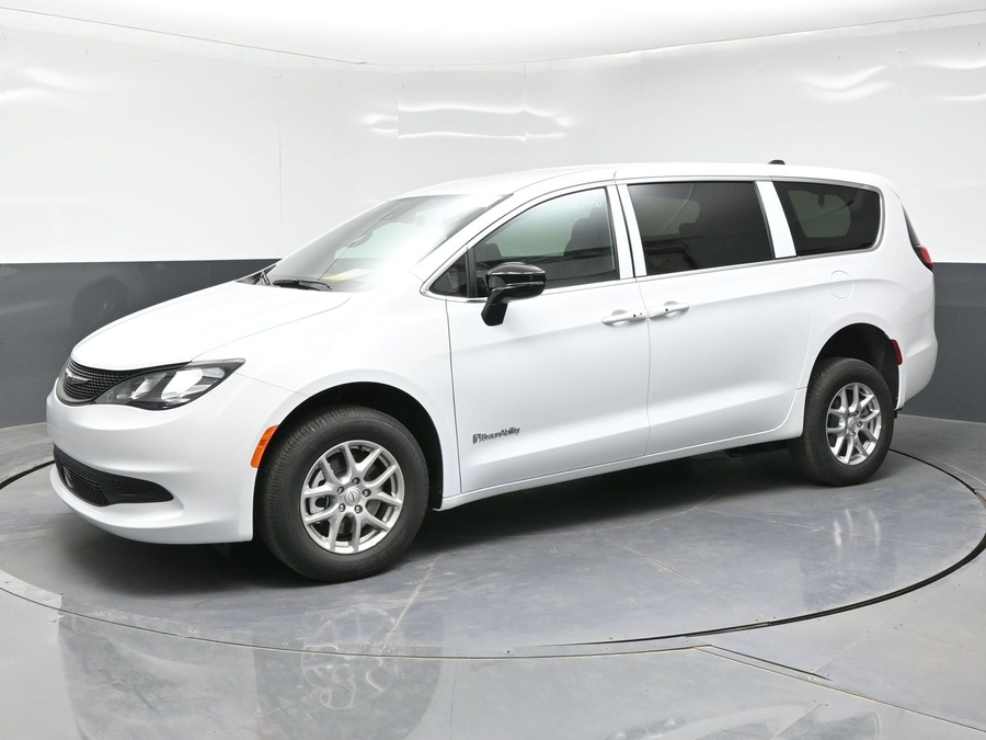 White Chrysler Voyager with BraunAbility Rear Entry Manual Fold Out conversion