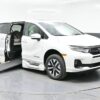 White Honda Odyssey with BraunAbility Side Entry Automatic In Floor conversion