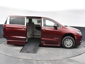 Red Chrysler Voyager with BraunAbility Side Entry Automatic Fold Out conversion