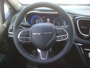 White Chrysler Voyager with BraunAbility Rear Entry Manual Fold Out conversion