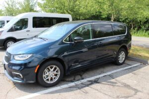 Blue Chrysler Pacifica with Driverge Side Entry Automatic Fold Out conversion