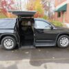 Black Chevrolet Traverse with ATC Side Entry Automatic  conversion