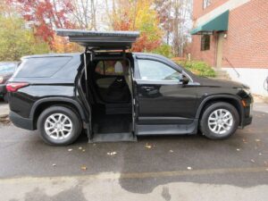 Black Chevrolet Traverse with ATC Side Entry Automatic  conversion