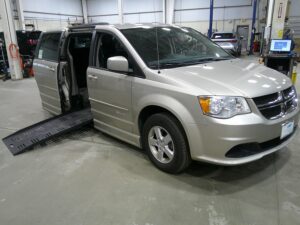 Brown Dodge Grand Caravan with BraunAbility Side Entry Automatic Fold Out conversion