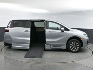 Silver Honda Odyssey with BraunAbility Side Entry Automatic In Floor conversion
