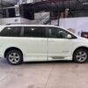 White Toyota Sienna with BraunAbility Side Entry Automatic Fold Out conversion