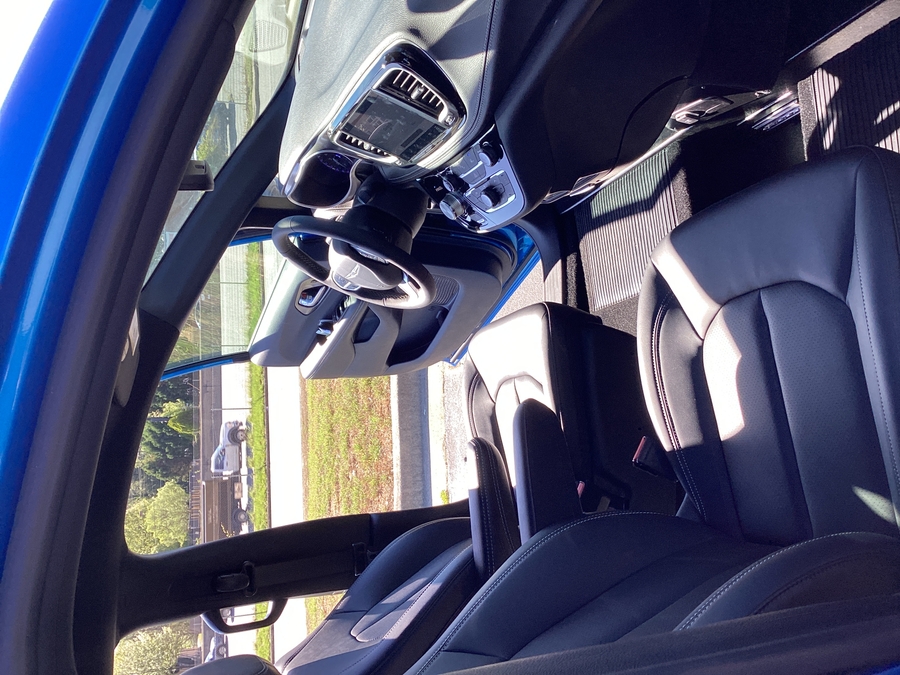Blue Chrysler Pacifica with Driverge Side Entry Automatic Fold Out conversion
