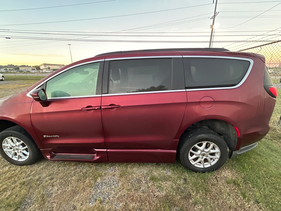 Red Chrysler Pacifica with BraunAbility Side Entry Automatic Fold Out conversion