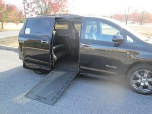 Black Toyota Sienna with BraunAbility Side Entry Automatic In Floor conversion