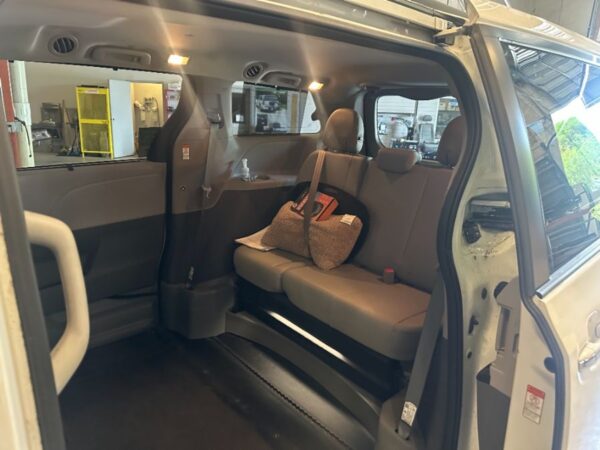 White Toyota Sienna with BraunAbility Side Entry Automatic In Floor conversion