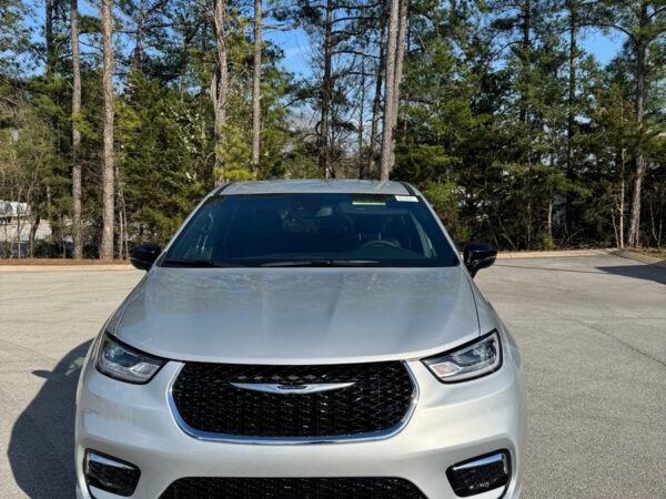 Silver Chrysler Pacifica with Driverge Side Entry Automatic Fold Out conversion