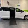 White Chrysler Voyager with Driverge Side Entry Automatic Fold Out conversion