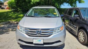 Silver Honda Odyssey with Vantage Mobility Side Entry Automatic In Floor conversion