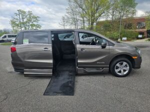Grey Honda Odyssey with BraunAbility Side Entry Automatic In Floor conversion