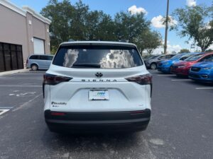 White Toyota Sienna with BraunAbility Side Entry Automatic In Floor conversion