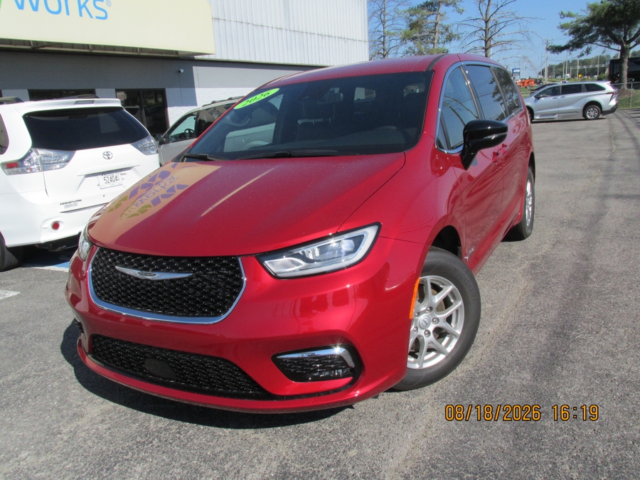 Red Chrysler Pacifica with Driverge Side Entry Automatic Fold Out conversion