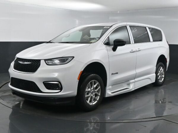 White Chrysler Pacifica with BraunAbility Side Entry Automatic Fold Out conversion