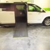 White Dodge Grand Caravan with Driverge Side Entry Automatic Fold Out conversion