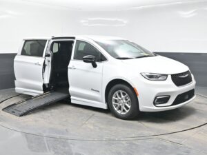 White Chrysler Pacifica with BraunAbility Side Entry Automatic Fold Out conversion
