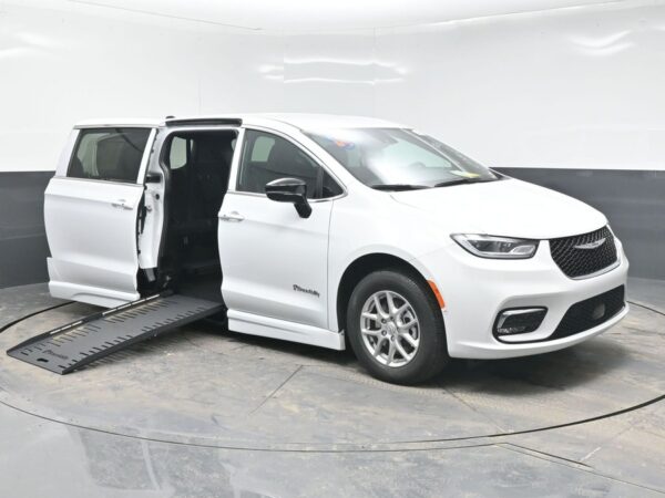 White Chrysler Pacifica with BraunAbility Side Entry Automatic Fold Out conversion