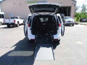 White Chrysler Pacifica with Driverge Rear Entry Manual Fold Out conversion