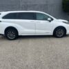 White Toyota Sienna with Driverge Rear Entry Manual Fold Out conversion
