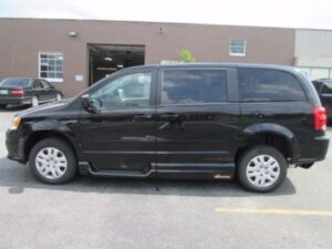 Black Dodge Grand Caravan with Vantage Mobility Side Entry Manual In Floor conversion
