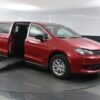 Red Chrysler Voyager with BraunAbility Side Entry Manual Fold Out conversion