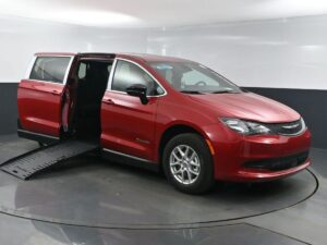 Red Chrysler Voyager with BraunAbility Side Entry Manual Fold Out conversion