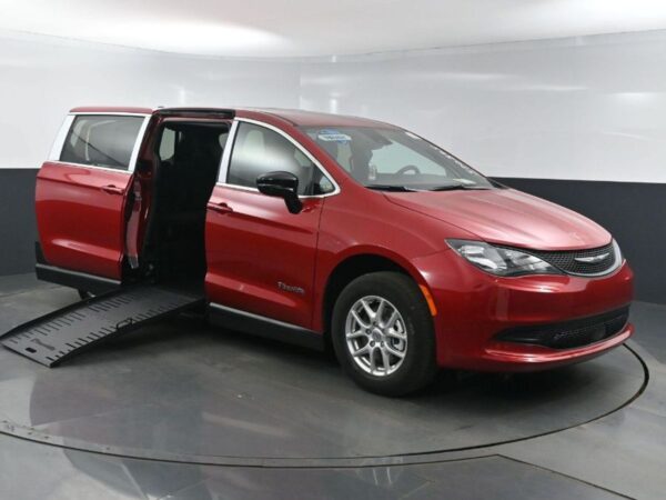 Red Chrysler Voyager with BraunAbility Side Entry Manual Fold Out conversion