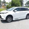 White Toyota Sienna with BraunAbility Side Entry Automatic Fold Out conversion