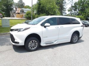 White Toyota Sienna with BraunAbility Side Entry Automatic Fold Out conversion