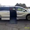 Silver Honda Odyssey with BraunAbility Side Entry Automatic In Floor conversion