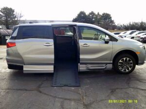 Silver Honda Odyssey with BraunAbility Side Entry Automatic In Floor conversion