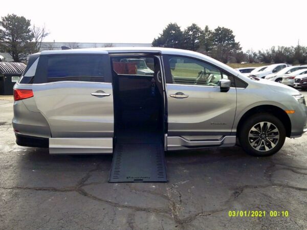 Silver Honda Odyssey with BraunAbility Side Entry Automatic In Floor conversion