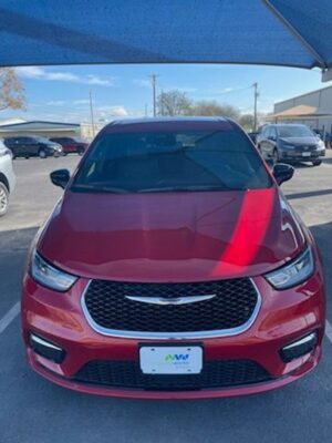 Red Chrysler Pacifica with Driverge Side Entry Automatic Fold Out conversion