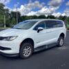 White Chrysler Voyager with BraunAbility Side Entry Manual Fold Out conversion