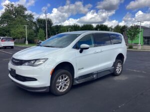 White Chrysler Voyager with BraunAbility Side Entry Manual Fold Out conversion