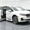 White Honda Odyssey with BraunAbility Side Entry Automatic In Floor conversion