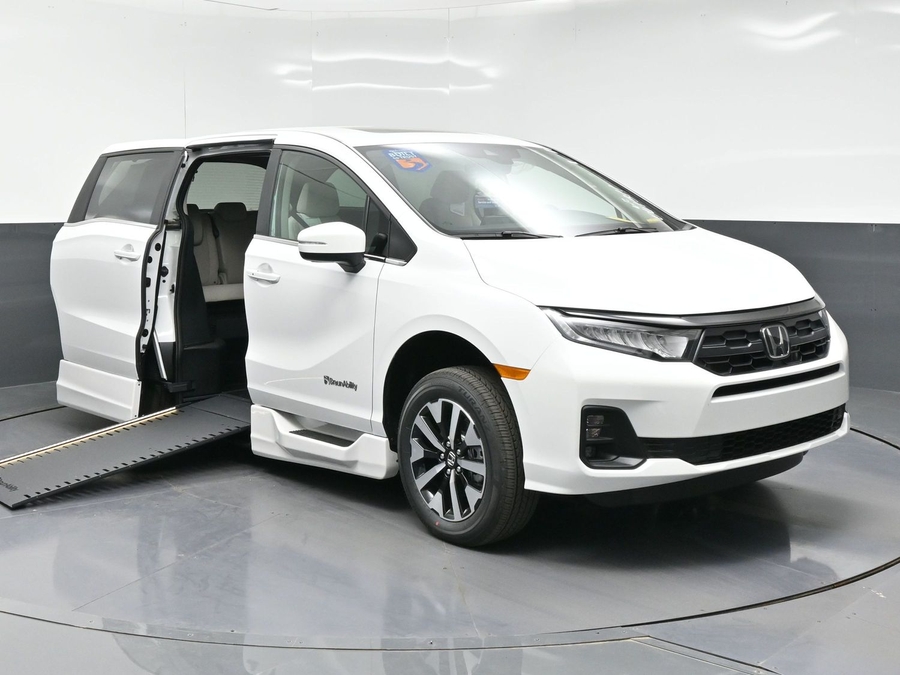 White Honda Odyssey with BraunAbility Side Entry Automatic In Floor conversion