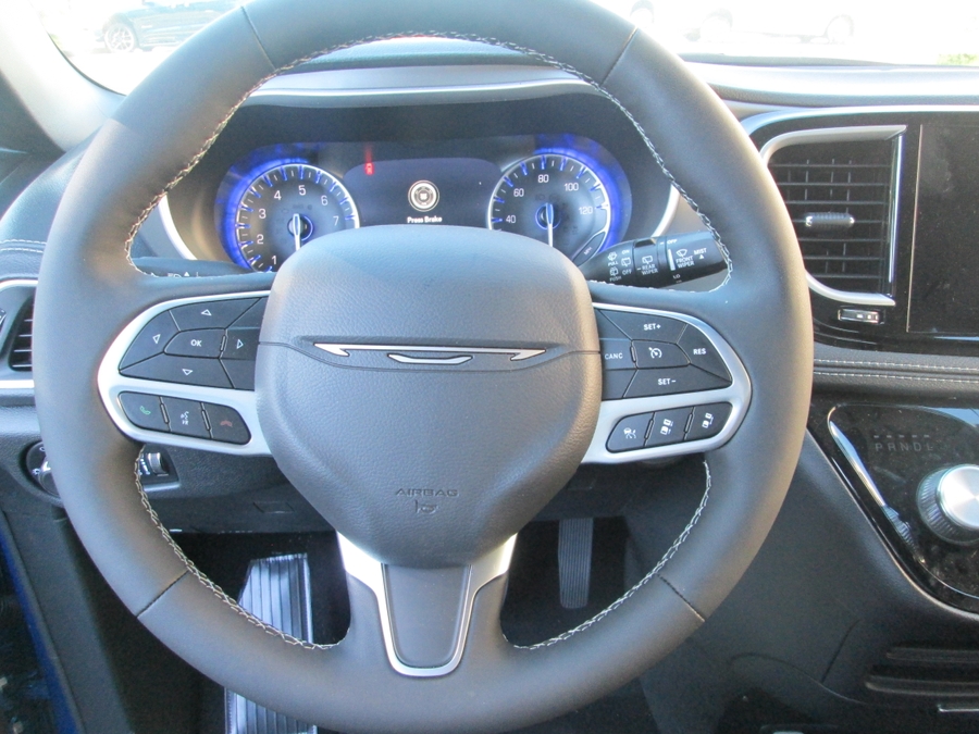 Blue Chrysler Pacifica with Driverge Side Entry Automatic Fold Out conversion