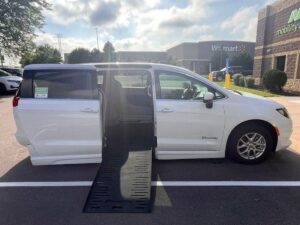 White Chrysler Voyager with BraunAbility Side Entry Automatic Fold Out conversion