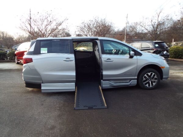 Silver Honda Odyssey with BraunAbility Side Entry Automatic In Floor conversion