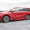 Red Honda Odyssey with BraunAbility Side Entry Automatic In Floor conversion