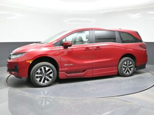 Red Honda Odyssey with BraunAbility Side Entry Automatic In Floor conversion