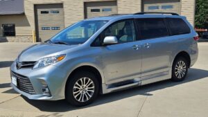 Silver Toyota Sienna with BraunAbility Side Entry Automatic Fold Out conversion