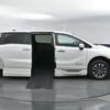 White Honda Odyssey with BraunAbility Side Entry Automatic In Floor conversion