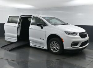White Chrysler Pacifica with BraunAbility Side Entry Automatic Fold Out conversion