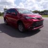 Red Toyota Sienna with BraunAbility Side Entry Automatic Fold Out conversion